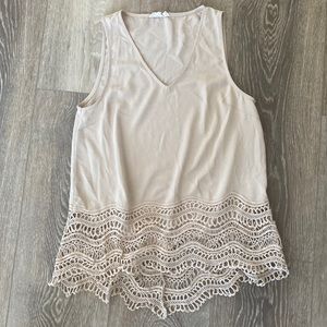 Light pink tank top originally purchased from a local boutique!